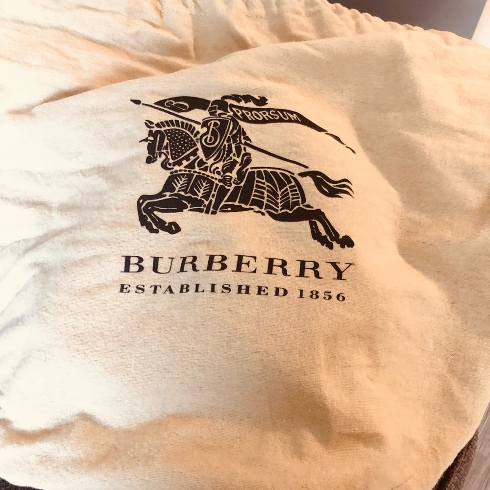 Burberry leather and cloth very clean inside and out still like new small size